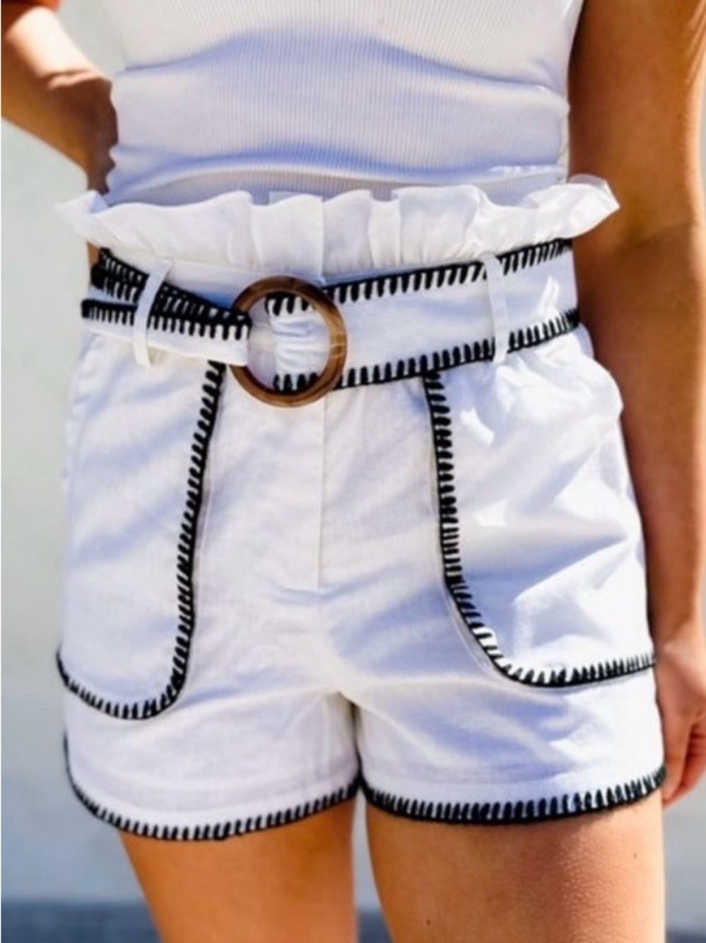 High-Waist White Paperbag Shorts with Black Trim and Brown Buckle